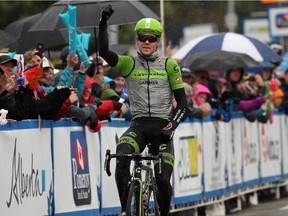 Lasse Norman Hansen of Denmark celebrates as he approaches the finish to win Stage 5 of the 2015 Tour of Alberta from Edson to Spruce Grove on September 6, 2015.