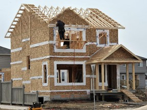 A home under construction in the southeast Edmonton community of Laurel. Residential projects have continued despite the province's recent economic downturn.