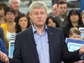 Conservative Leader Stephen Harper's election campaign got a boost from a budget surplus on Monday.