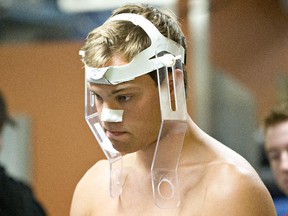 Edmonton Oilers' Taylor Hall waits to be fitted with a V02 mask before riding the bike during the first day of training camp in Edmonton, Alta., on Thursday, September 17, 2015.