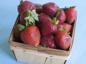 Covering strawberries with a floating row cover can help keep insects away.