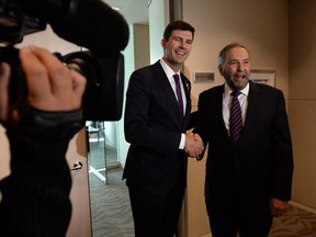 NDP leader Tom Mulcair meets with Edmonton mayor Don Iveson at city hall in Edmonton on Friday, September 11, 2015.