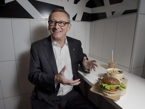 McDonald's Canada CEO John Betts with his made to order burger at the companies St. Clair Avenue East location, Wednesday Sept. 30, 2015.