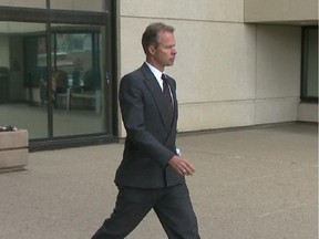 Arnold Donszelmann, former owner of Leisure RV Rentals near Millet, leaves the Edmonton Courthouse during a break during his July 2014 sentencing hearing for 31 counts of fraud over $5,000.