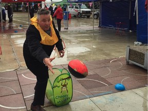 Coun. Dave Loken on Tuesday helped launch the upcoming Community League Day during a relay race at City Hall.