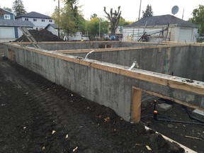 It's easy to find construction sites without proper fencing in many of Edmonton's mature neighbourhoods. This photo was taken in Eastwood Sept. 14, 2015. City council plans next month to tackle the issue of poor building practices.