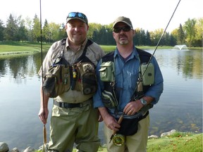 Seasoned anglers Simon Smith (left) and Curtis Webber didn't know the pond at the Royal Mayfair Golf and Country club was stocked with rainbow trout. They received permission to fish and last week landed 10, which they released. The pond is stocked in the spring and the fish die because of a lack of oxygen when it freezes over in winter.