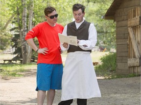 Sean Sweeney, left, and his brother Brent go over an Amazing Race Canada challenge in Fort Edmonton Park.