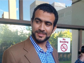 Omar Khadr stood outside court recently after he won a relaxed curfew so he could take a night course.