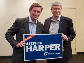 Wayne Gretzky poses with Stephen Harper during a campaign event in Toronto. Handout/Postmedia Network