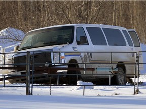 Two men fled the Whitecourt courthouse in this sheriffs van before it got stuck in a ditch Feb. 26, 2013. One of the escapees was sentenced Friday to 14 years in prison.