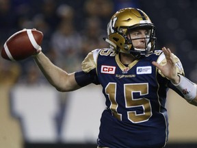 Winnipeg Blue Bombers quarterback Matt Nichols (15) throws during the second half of CFL action against the Calgary Stampeders in Winnipeg on Sept. 25, 2015.