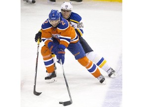 St. Louis Blues' Alexander Steen (20) chases Edmonton Oilers' Andrej Sekera (2) during second period NHL action in Edmonton, Alta., on Thursday October 15, 2015.
