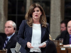 Health Minister Rona Ambrose stands in the House of Commons during Question Period on Parliament Hill, Wednesday, June 10, 2015 in Ottawa.THE CANADIAN PRESS/Fred Chartrand