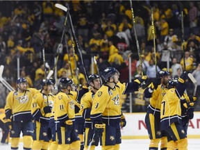 NASHVILLE, TN Ð OCTOBER 8:  Nashville Predators salute their fans after defeating the Carolina Hurricanes 2-1at Bridgestone Arena on October 8, 2015 in Nashville, Tennessee.