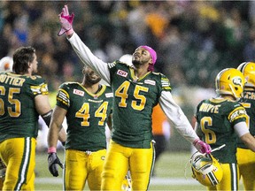 Edmonton Eskimos' Dexter McCoil (45) celebrates another come-from-behind CFL victory, this one in overtime, against the B.C. Lions at Commonwealth Stadium on Oct. 17, 2015.