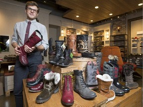 Everett Kunitz shows some of the trends in winter boots at his Jasper Avenue shop, Kunitz Shoes.