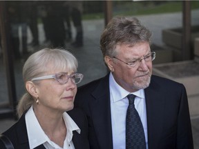 Richard Suter and his wife outside court, 2015.