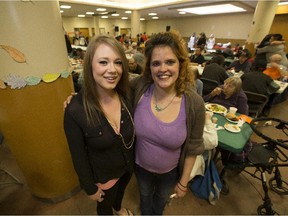 Katie Archibald, left, and Stepahnie Foller  were able to take part in the annual Hope Mission Thanksgiving banquet on Friday, Oct. 9, 2015.