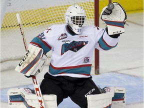 Kelowna Rockets' Michael Heringer makes a save against the Edmonton Oil Kings during first period WHL action on Oct. 2, 2015 in Edmonton.