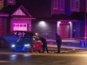 Edmonton police have a section of residential road in the south Edmonton community of Windermere blocked off to investigate a crime scene involving a parked Audi.