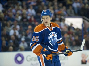 Nikita Nikitin plays  the Calgary Flames at Rexall Place.