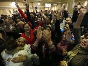 The crowd at Edmonton-Mill Woods candidate Amarjeet Sohi began to celebrate as election results came in Monday night.