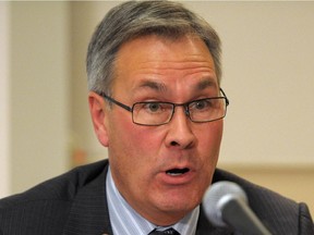 Dr. Paul Grundy, pictured in a 2011 photo, has parted ways with Alberta Health Services.