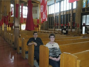 Barbara Burrows (right, Lay Canon, Diocese of Edmonton, Anglican Church of Canada) and Reverend Travis Enright (left, Diocese of Edmonton, Anglican Church of Canada) at All Saints' Anglican Cathedral in Edmonton where the Truth and Reconciliation exhibit on residential schools starts Tuesday October 13, 2015.