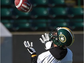 Edmonton Eskimos slotback Kenny Stafford makes an over-the-shoulder grab during Tuesday's practice at Commonwealth Stadium.