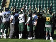 The Edmonton Eskimos have a giant huddle during a team practice at Commonwealth Stadium in Edmonton on Oct. 14, 2015.