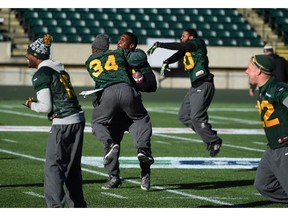 Edmonton Eskimos defensive players were loose and having fun during practice on Friday, Oct. 16, 2015, at Commonwealth Stadium.