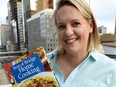 Julie Van Rosendaal with her new cookbook, Best of Bridge Home Cooking