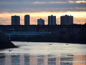 The sunrise reflects in the North Saskatchewan River in Edmonton on Thursday, Oct. 22, 2015.