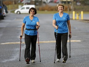 From left, Urban Poling's  Susan Yackulic and Mandy Johnson take a brisk walk. Adding poles to your walking can increase your calorie burn by up to 40 per cent. Nordic walking is also well suited to our icy winter sidewalks.