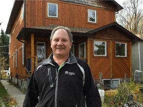Andy Banack in front of an infill house he built on the south side in Edmonton on Thursday.