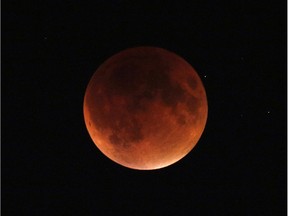 A super moon combined with a lunar eclipse over the Edmonton skies on Sunday September 27, 2015. This rare occurrence usually happens only once in a generation.