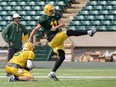 Edmonton Eskimos kicker Grant Shaw boots a field goal during the CFL team's practice at Commonwealth Stadium on Aug. 24, 2015.
