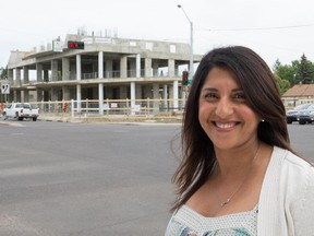 Salima Kheraj, principal at InHouse development, poses for a photo at the Glenora site at 142nd Street and Stony Plain Road in Edmonton on July 31, 2015.