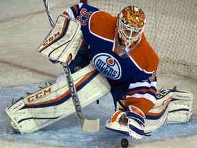 Oilers goalie Cam Talbot  makes a save during pre-season action at Rexall Place on Oct. 1, 2015.