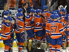 The Edmonton Oilers head off the ice after losing to the St. Louis Blues 4 - 2 during their NHL season home opener at Rexall Place in Edmonton on Oct. 15, 2015.