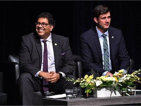 Calgary mayor Naheed Nenshi and Edmonton mayor Don Iveson attend the 10th annual Hurtig Lecture at the University of Alberta's Myer Horowitz Theatre in Edmonton on Oct. 21, 2015.