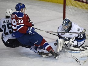 Oil Kings' Brett Pollock is stopped by Saskatoon Blades goalie Nik Amundrud during Western Hockey League action at Rexall Place in Edmonton, Oct. 21, 2015. Pollock has been named to Team WHL for the CHL Canada-Russia Series next month.