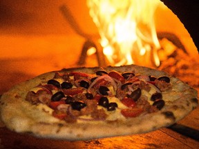 Pretty pizzas are cooked in the wood-fired oven at Buco, in St. Albert.