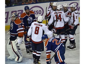 Washington Capitals celebrate their fifth goal by Andre Burakovsky (65) against the Edmonton Oilers at Rexall Place on Oct. 24, 2015.