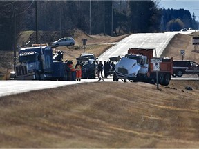 A gravel truck heading north on Golden Spike Road collided with a pickup westbound on  Highway 628 near Spruce Grove on Saturday. Three people in the pickup were killed.