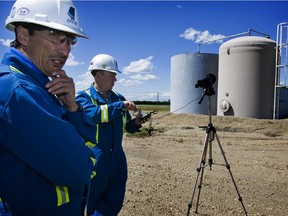 Fugitive emissions, small natural-gas leaks from pipes and valves, can be detected using special infrared cameras similar to those pictured here during an inspection in 2008 by Alberta's energy regulator.