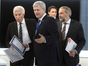 From left, Bloc Quebecois Leader Gilles Duceppe, Conservative Leader Stephen Harper, Liberal Leader Justin Trudeau and NDP Leader Tom Mulcair leave the set after the French-language debate Sept. 24, 2015 in Montreal.