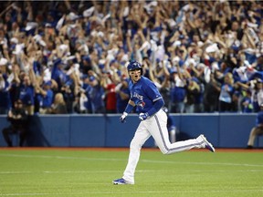 Troy Tulowitzki of the Toronto Blue Jays runs the bases after hitting a three-run home run in the third inning against the Kansas City Royals during game three of the American League Championship Series at Rogers Centre on Oct. 19, 2015 in Toronto. The Blue Jays won Game 3 by a score of 11-8.