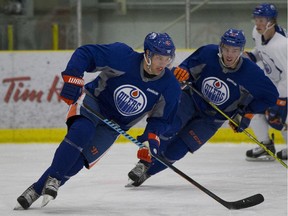 Taylor Hall and Connor McDavid skate laps at the Edmonton Oilers open training camp in Leduc on September 18, 2015 in Edmonton.